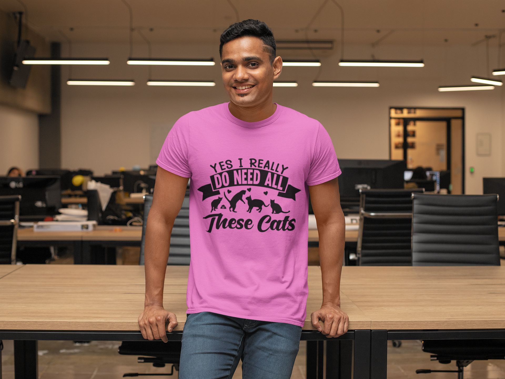 Humorous Cat Lover T-Shirt - 'Yes I Really Do Need All These Cats' Bold Graphic Design in Monochrome - Playful Cat Silhouettes & Heart Accents on Gray Unisex Crew Tee