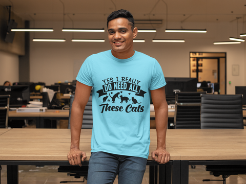 Humorous Cat Lover T-Shirt - 'Yes I Really Do Need All These Cats' Bold Graphic Design in Monochrome - Playful Cat Silhouettes & Heart Accents on Gray Unisex Crew Tee