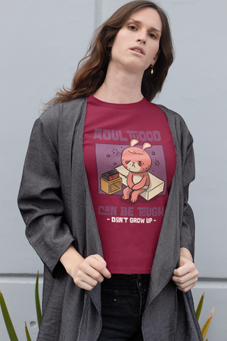 Women’s Cotton T-Shirt – “Adulthood Can Be Tough, Don’t Grow Up” Funny Cartoon Graphic Tee