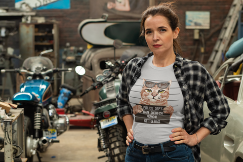 Humorous Cat Mugshot T-Shirt - Quirky Unisex Tee with Rebellious Sunglasses Design in Earthy Tones