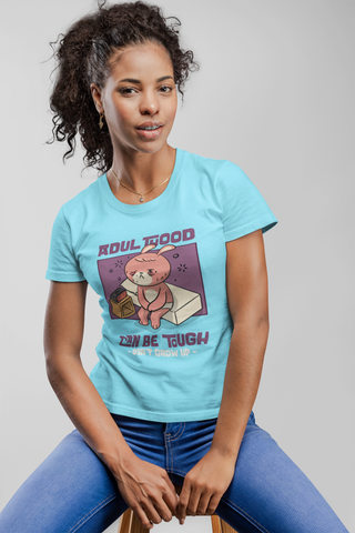 Women’s Cotton T-Shirt – “Adulthood Can Be Tough, Don’t Grow Up” Funny Cartoon Graphic Tee